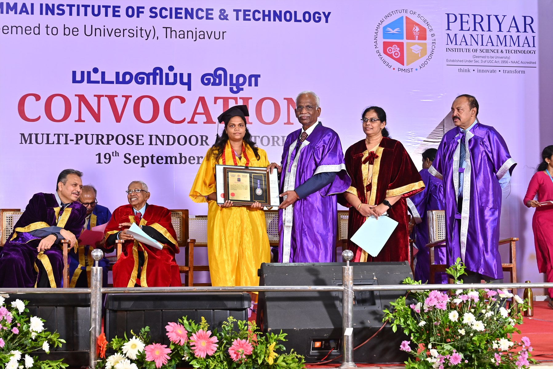 Graduate receiving an award at the PMIST convocation