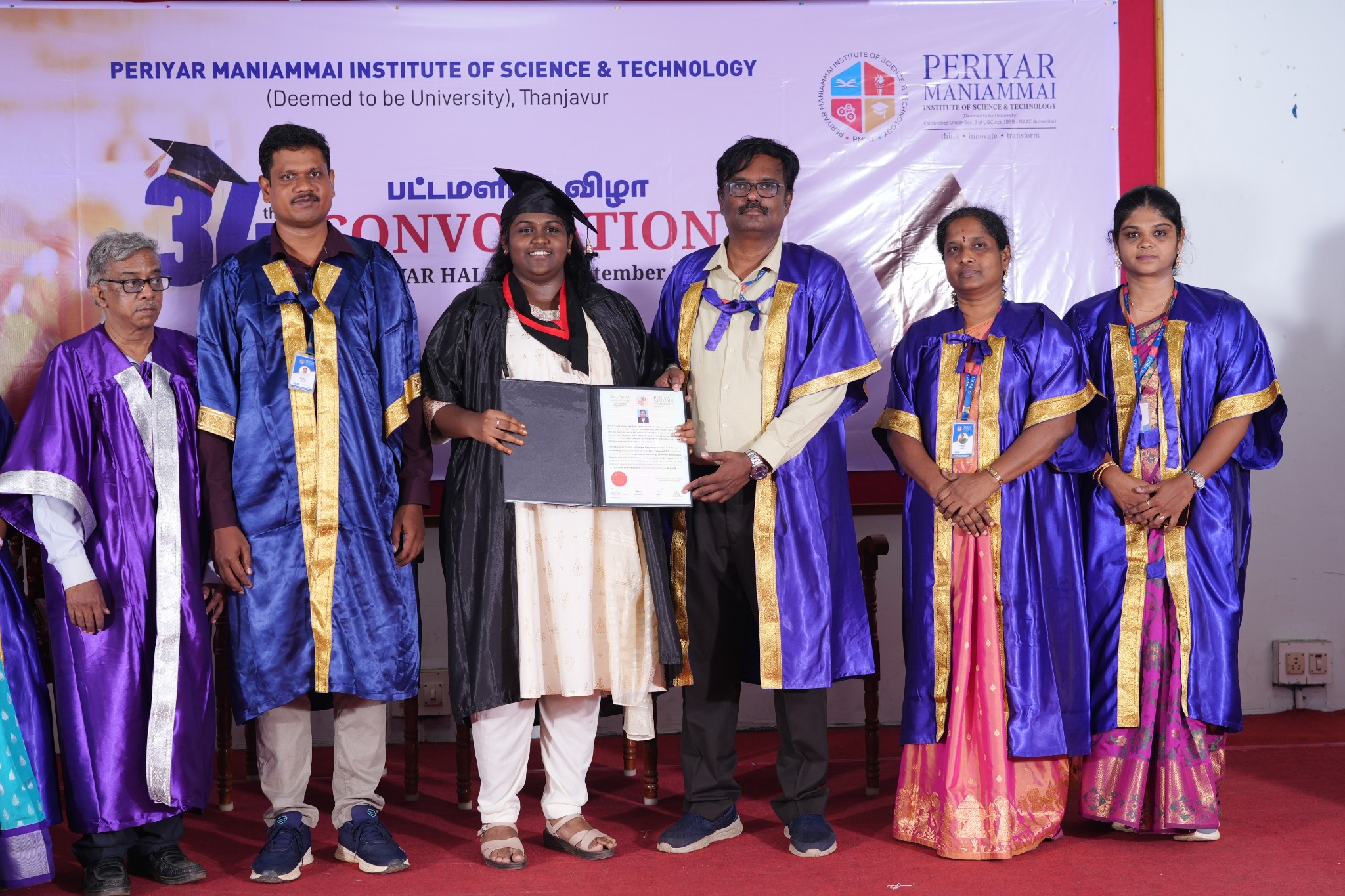 Certificate presentation with faculty members